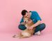 man-holding-a-dog